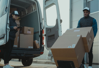 man unloading a van